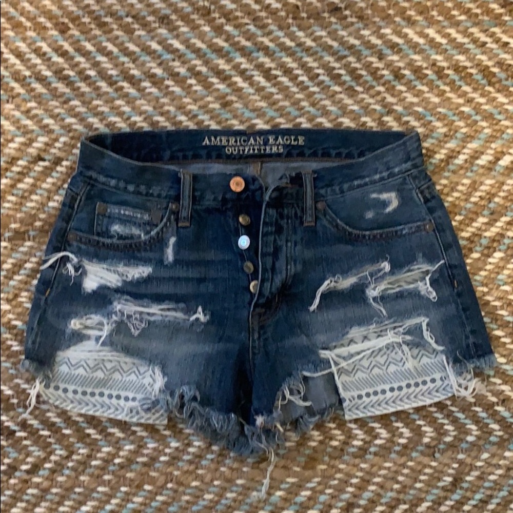 Distressed denim shorts
